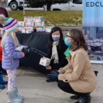 Salt Lake City Mayor Erin Mendenhall (right) and Millions of Masks for Children Co-Founder Trang Le with children at event celebrating the donation of one million masks to children across Utah. The donation was made possible by FLTR, a leading supplier of a wide range of personal protective equipment (PPE), that donated the one million masks. SmartAID and the Economic Development Corporation of Utah organized the distribution of the masks. DHL provided shipping to Utah on a pro-bono basis. Photo courtesy of Millions of Masks for Children.